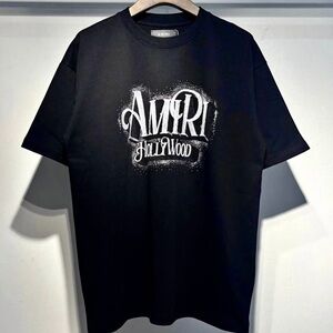 AMIRI Black Tee with White Hollywood Graphic